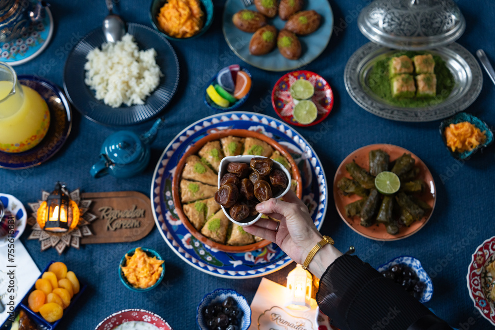 Ramadan Iftar Table. Muslim Family Having Dinner At Home. Iftar Table with Traditional Food. Fasting ends with Dates. Ramadan Feast Celebrations, Eid Mubarak Concept Uskudar Istanbul, Turkiye (Turkey) Ramadan Iftar Table. Muslim Family Having Dinner At Home. Iftar Table with Traditional Food. Fasting ends with Dates. Ramadan Feast Celebrations, Eid Mubarak Concept Uskudar Istanbul, Turkiye (Turkey)