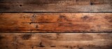 This close-up view showcases the textured surface of a wooden plank wall, revealing the natural grains and patterns of the wood. Each plank is distinct, creating a rustic and tactile backdrop.