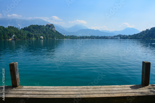 Cloudy summer day by the lake Bled in Slovenia with its clear turquoise water and famous castle and church
