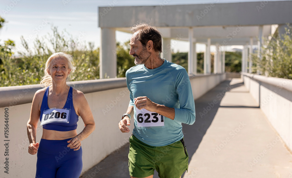 senior couple body training in exercise running marathon , cardiovascular wellness