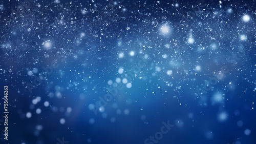 abstract blue background with bokeh lights and falling snowflakes © Raffaza