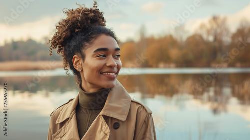 Portrait of a Smiling Young Woman in Beige Trench.