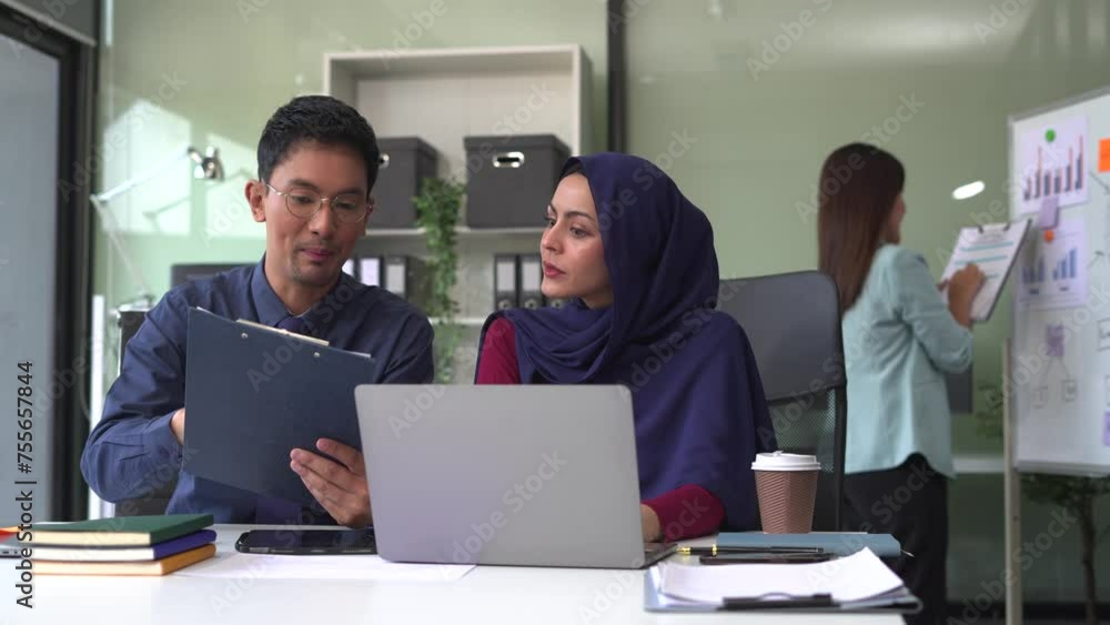 Businessman working as a team start meeting the new marketing project plan By business people using tablets and graph documents Calculate the amount of money for the project. Businessman working as a team start meeting the new marketing project plan By business people using tablets and graph documents Calculate the amount of money for the project.