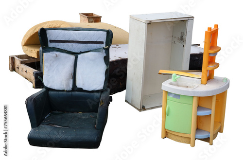 Old broken furniture in a garbage dump isolated