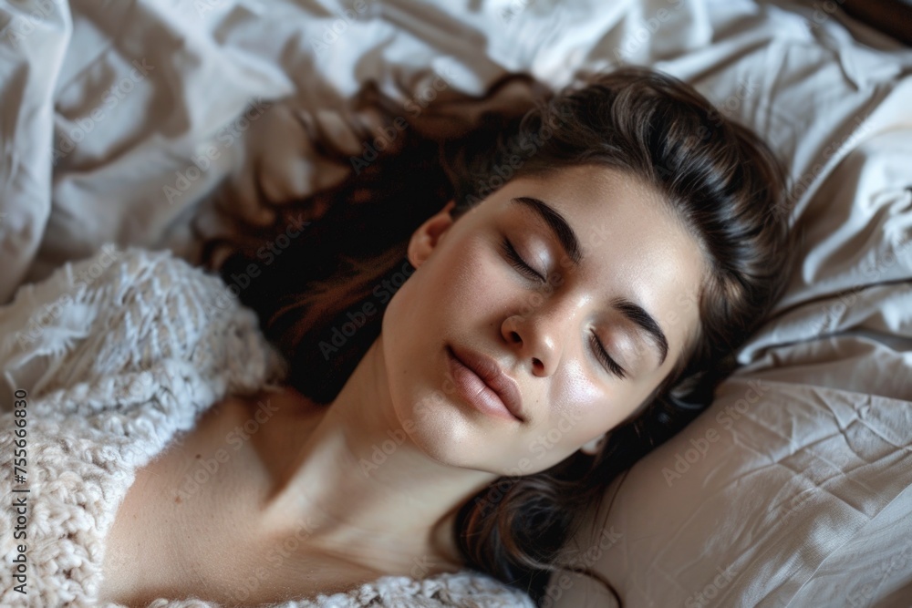 Woman lying in bed sleeping on a pillow, concept of relaxation, rest. Woman lying in bed sleeping on a pillow, concept of relaxation, rest.