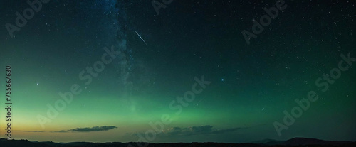 Green and Blue Sky With Stars and Clouds
