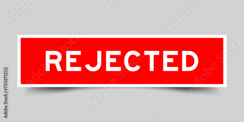 Square sticker label with word rejected in red color on gray background