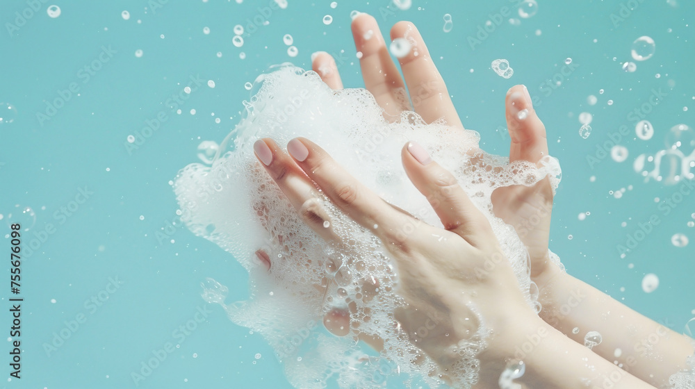 Hand washing. Hands in soap foam on blue background. Copy space. Hand washing. Hands in soap foam on blue background. Copy space.