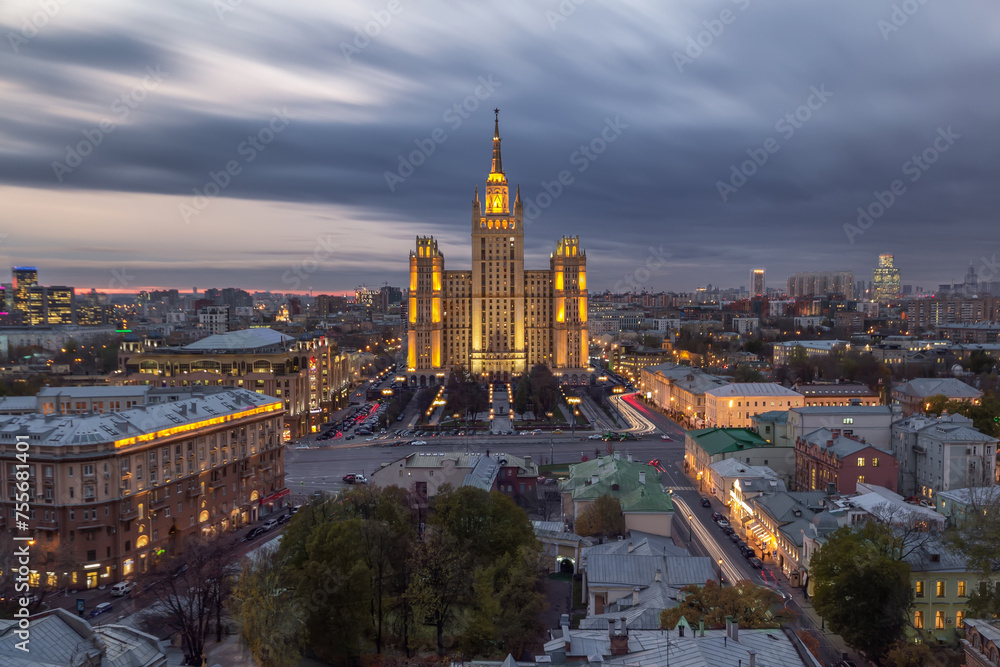 Residential building on Kudrinskaya Square in Moscow is made in Stalin empire style at night