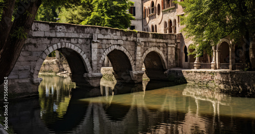 bridge over a small canal in the style of Italy