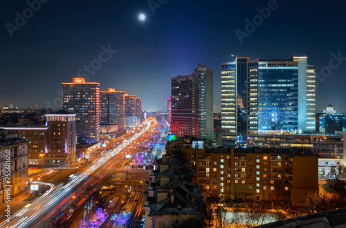 New Arbat Street  highway with moving cars at moony night in Moscow  Russia