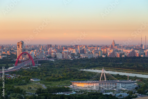 Bridge and stadium among trees near pond in Moscow, Russia at summer © Pavel Losevsky