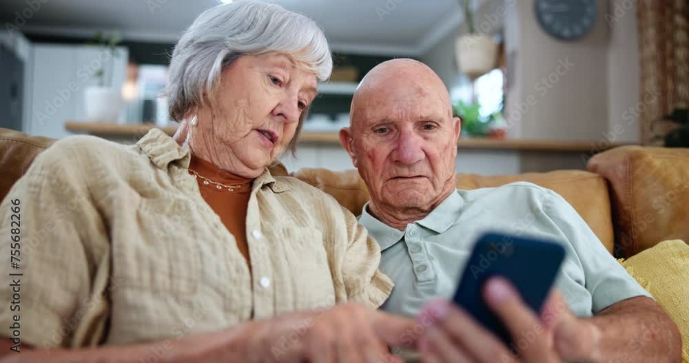 Elderly, couple and cellphone on couch for technology learning in retirement for online network, questions or message. Man, woman and smartphone on sofa for teaching communication, explain or helping Elderly, couple and cellphone on couch for technology learning in retirement for online network, questions or message. Man, woman and smartphone on sofa for teaching communication, explain or helping
