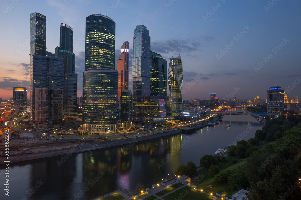 Obraz premium Moscow International Business Center and quay at evening. Investments in Moscow International Business Center was approximately 12 billion dollars