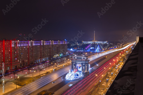 Arch of Triumph with illumination and Poklonnaya Hill Memorial at night in Moscow, Russia