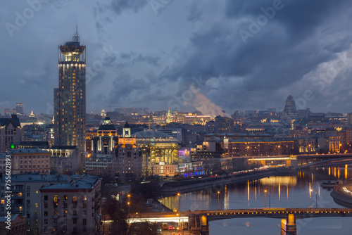 Novospassky bridge, Moscow river, House of music and evening panorama of Moscow, Russia