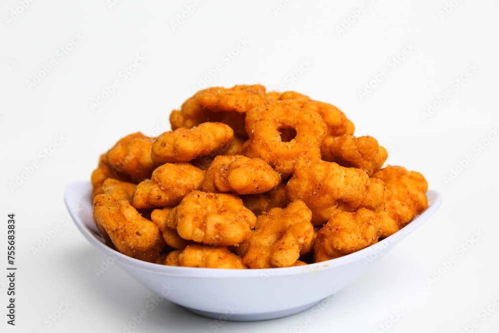 Sakura ribut, fried dough with flower shape, savory taste. Snack from Indonesia. Isolated on white background Sakura ribut, fried dough with flower shape, savory taste. Snack from Indonesia. Isolated on white background
