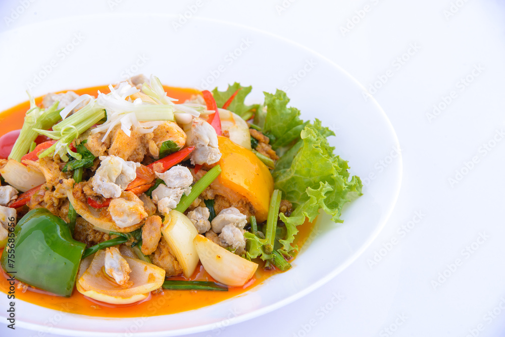 Sweet and sour crab stir fried on the white dish. Sweet and sour crab stir fried on the white dish.