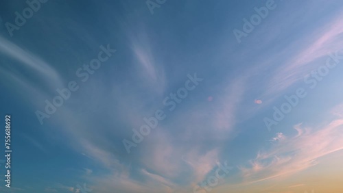 Cloudscape moving on beautiful bright sunny clear blue sky. Cloudscape slowly moved on daylight horizon. photo