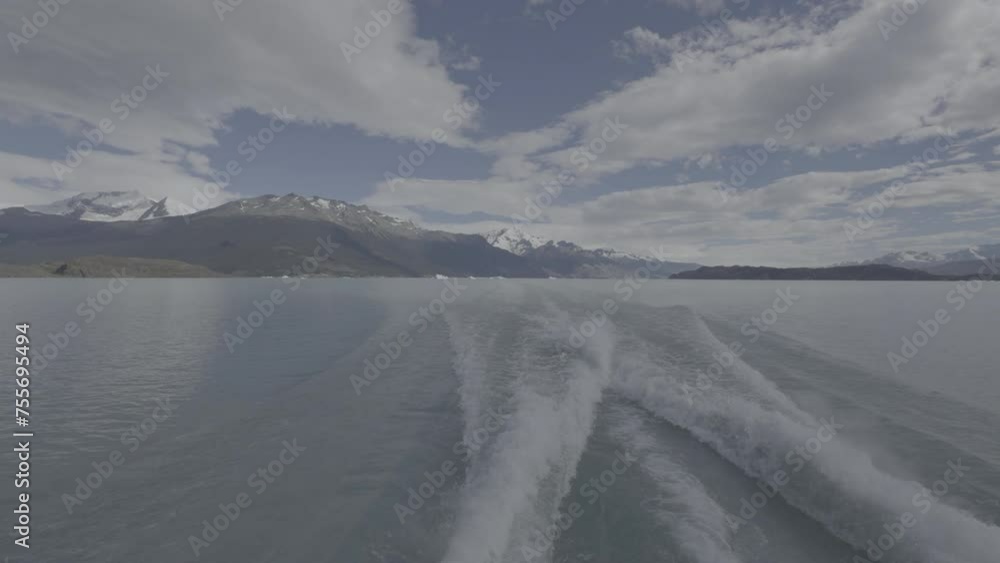 Serene Yacht Journey on a Pristine Glacial Lake at Summer Serene Yacht Journey on a Pristine Glacial Lake at Summer