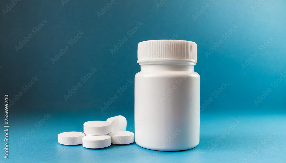 White plastic jar and heap of pills. Pharmaceutical vitamin or drug. Medical care and treatment. White plastic jar and heap of pills. Pharmaceutical vitamin or drug. Medical care and treatment.