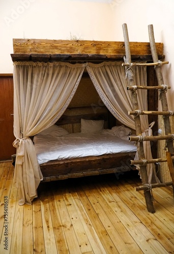 Obraz na plátně Bunk bed with canopy in rustic style