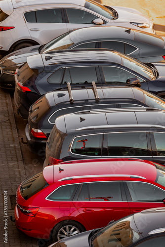 Parked cars in straight line during heavy traffic for aftermarket re selling photo