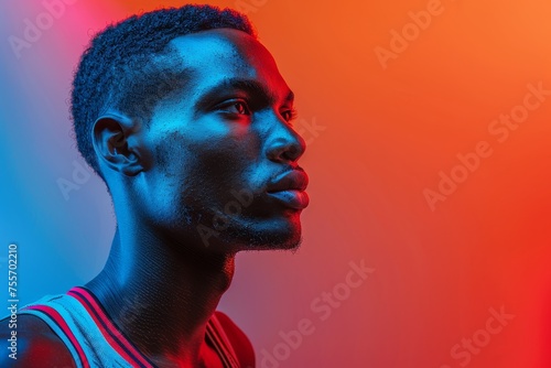 Athletic Man with Intense Gaze in Neon Light