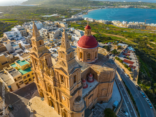 Drone view of The Parish Church in Mellieha. Blue sky, sea, day. Malta island  #755712693