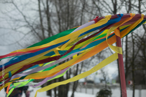 Folk Spring Festival. Colored ribbons on hoop. Totem object. Pagan rite.