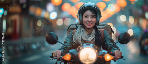 Smiling young Asian woman wear helmet and enjoying a motorbike ride on a bustling city street at golden hour. © NaphakStudio