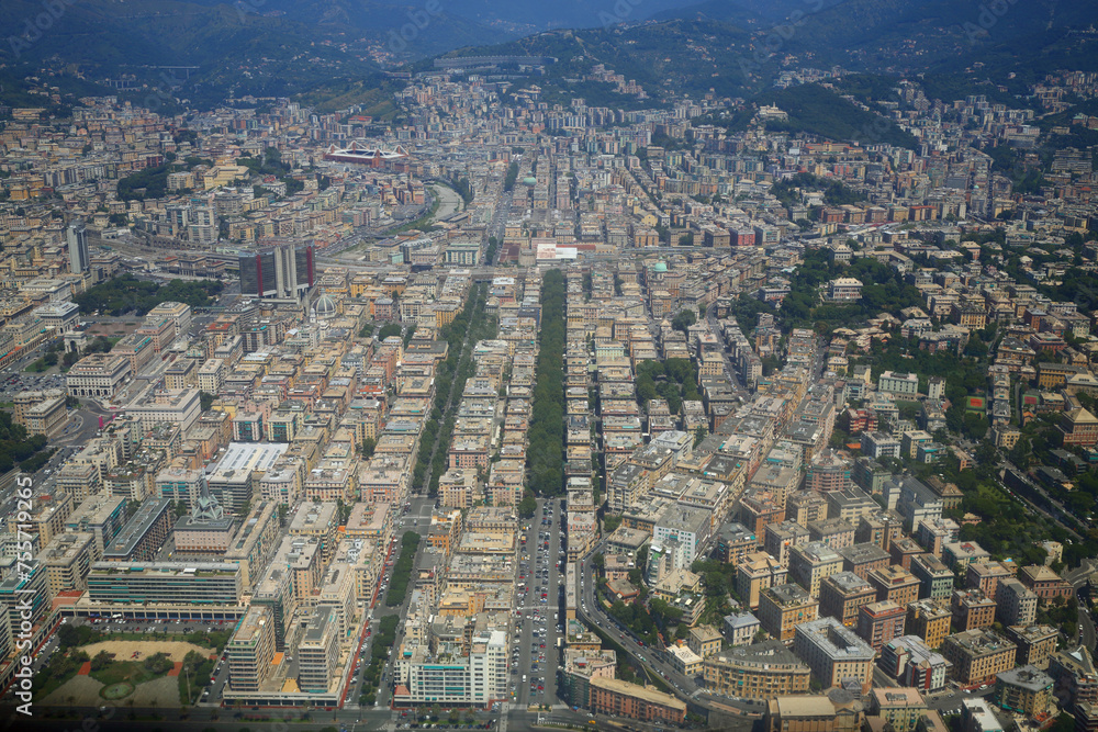 City panorama of Genoa, Italy at summer sunny day, aerial view