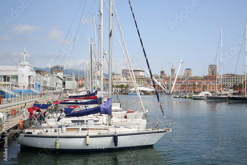 Many boats moored at Marina Porto Antico in Genoa, Italy at summer day