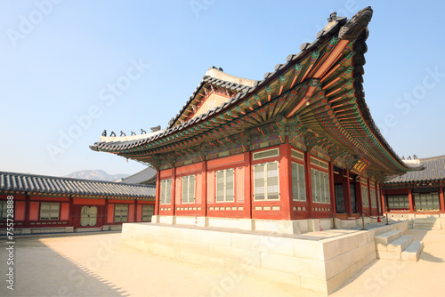 Houses with beautiful, decorated roof in Gyeongbokgung, Seoul at autumn day