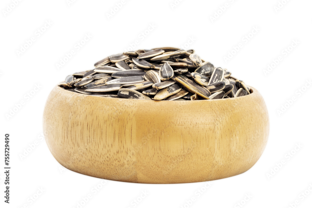 Sunflower seeds in a wooden bowl, healthy natural food Isolated on a white background - clipping path Sunflower seeds in a wooden bowl, healthy natural food Isolated on a white background - clipping path