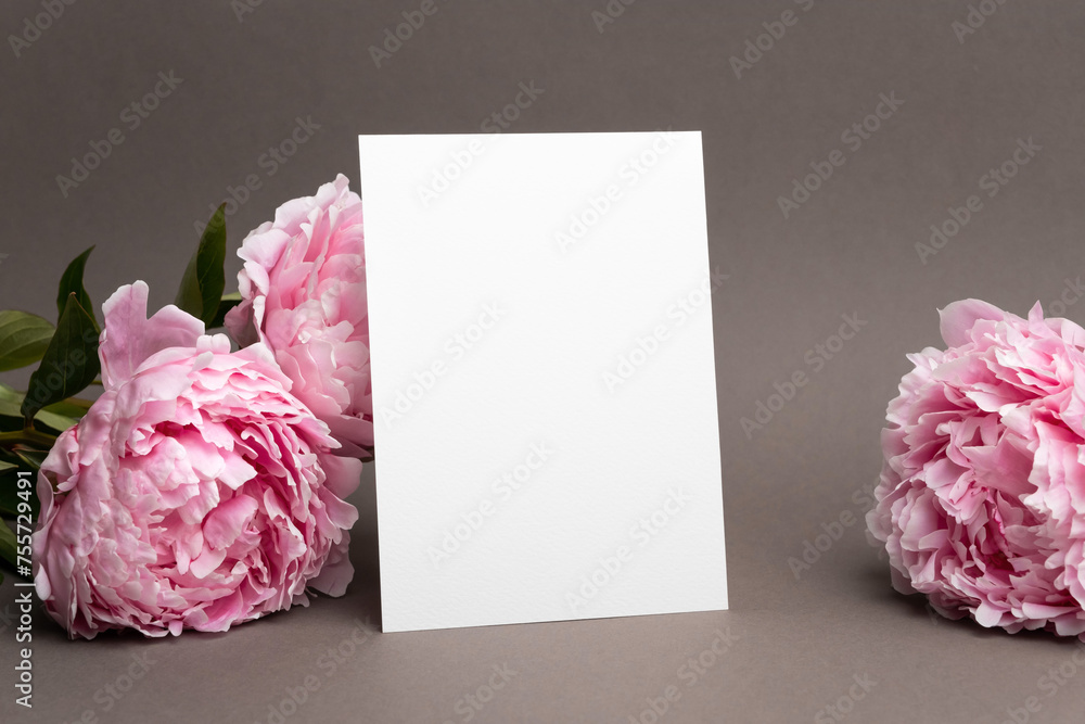 Obraz premium Wedding invitation or greeting card mockup with peony flowers, blank card mock up with copy space