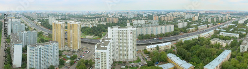 City panorama with Jaroslavskoe highway at summer cloudy day. Aerial view video frame photo