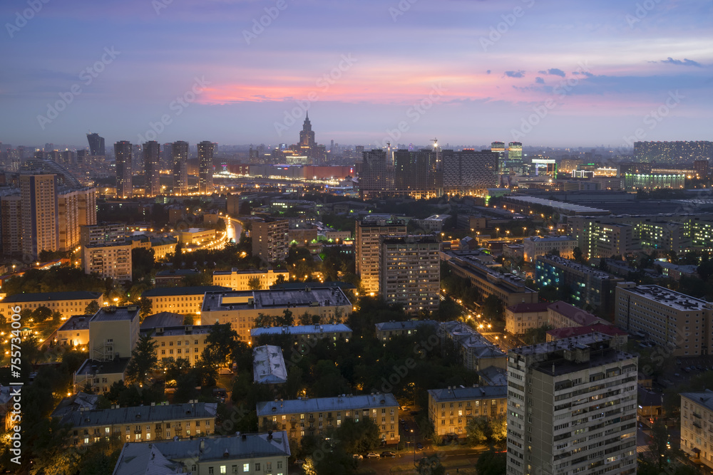 Residential buildings in sleeping area, skyscrapers and roofs at summer night in Moscow, Russia, Khoroshyovsky District