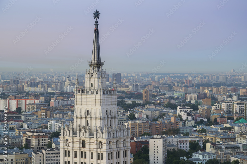 Panoramic view with many roofs, spire of Stalin skyscraper Red Gate in morning of Moscow, Russia