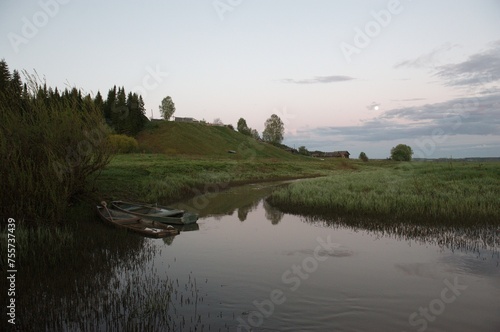 river reflection of the moon moon house village grass hill evening summer boats
