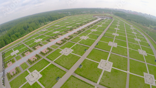 Large territory of Federal Memorial Cemetery at spring cloudy day. Aerial view video frame photo