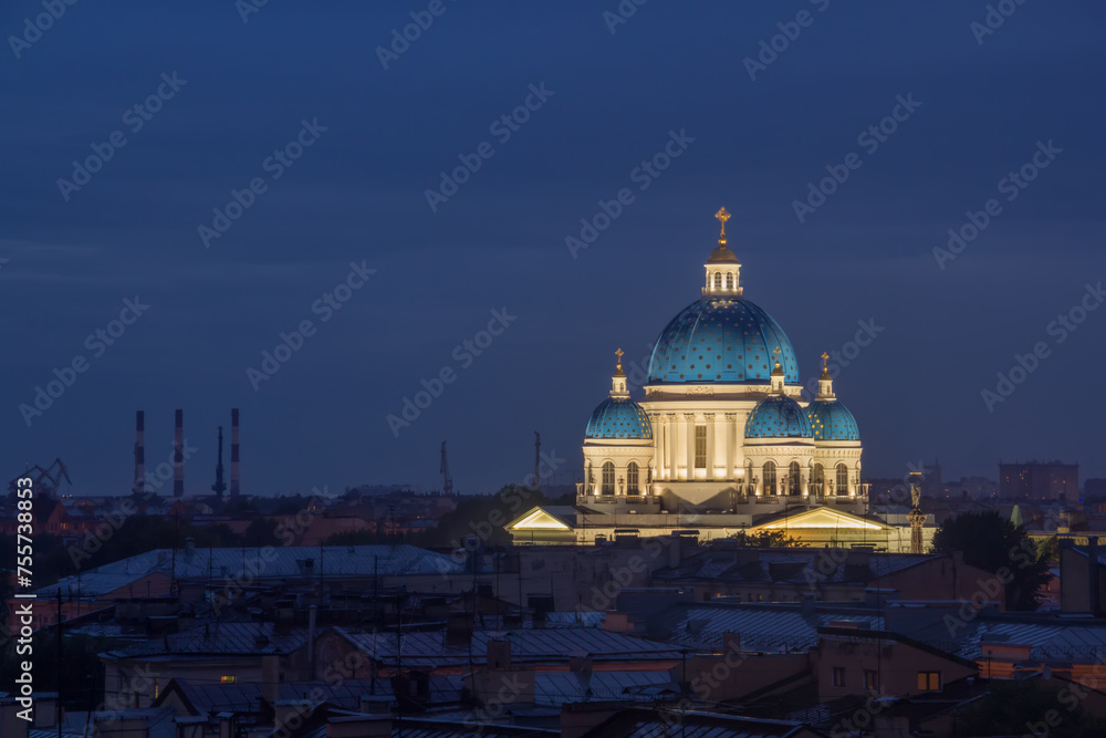 Domes of Trinity Cathedral and roofs at night in Saint Petersburg, Russia