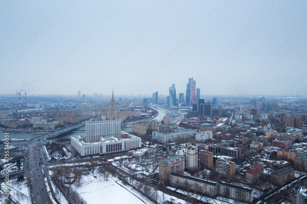 Fototapeta premium Highway, government building, river, skyscrapers at winter in Moscow, Russia