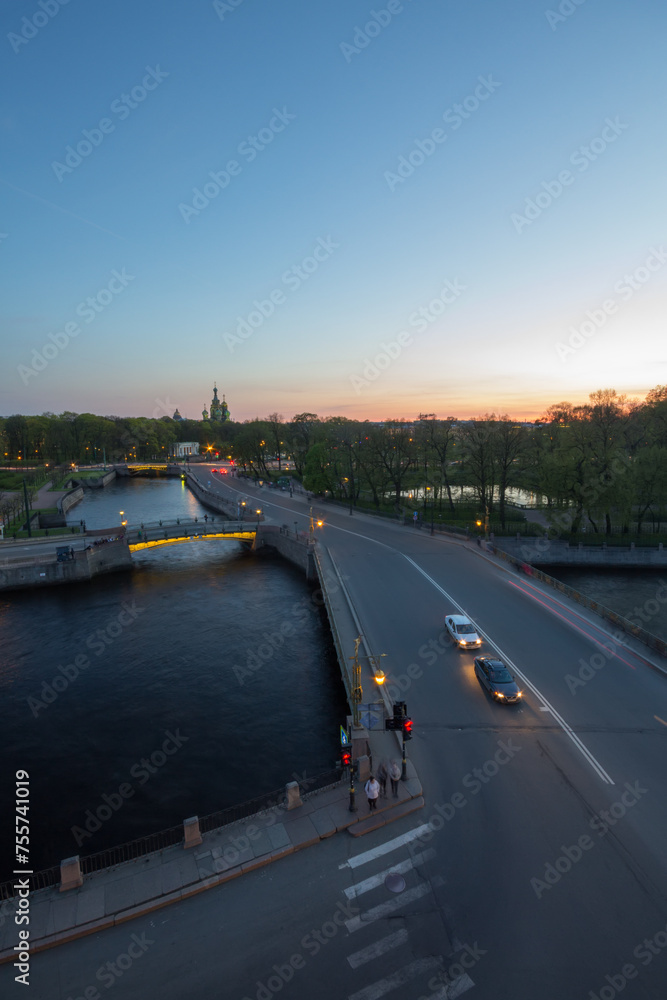 Panteleymonovsky bridge, channels, park at evening in St. Petersburg, Russia