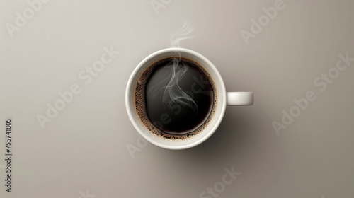 Top view of a steaming cup of black coffee on a gray surface, exuding a warm, inviting aroma.