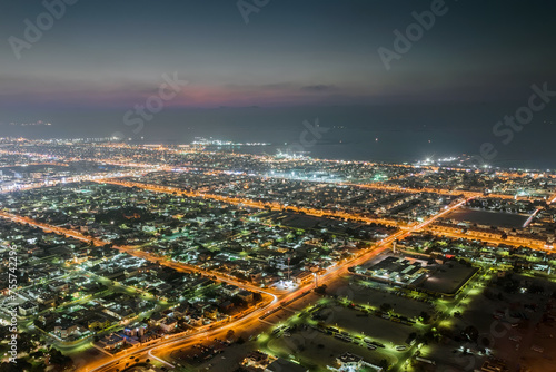 Sawta area with illumination and sea far away in resort Dubai, UAE at night photo