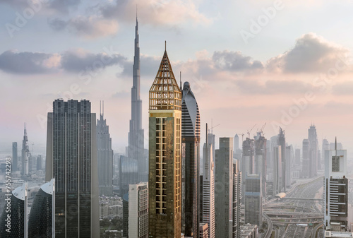 DUBAI, UAE - JAN 8, 2017: Burj Khalifa, Rose Rayhaan by Rotana, Ahmed Abdul Rahim Al Attar Tower, Sheikh Zayed Highway