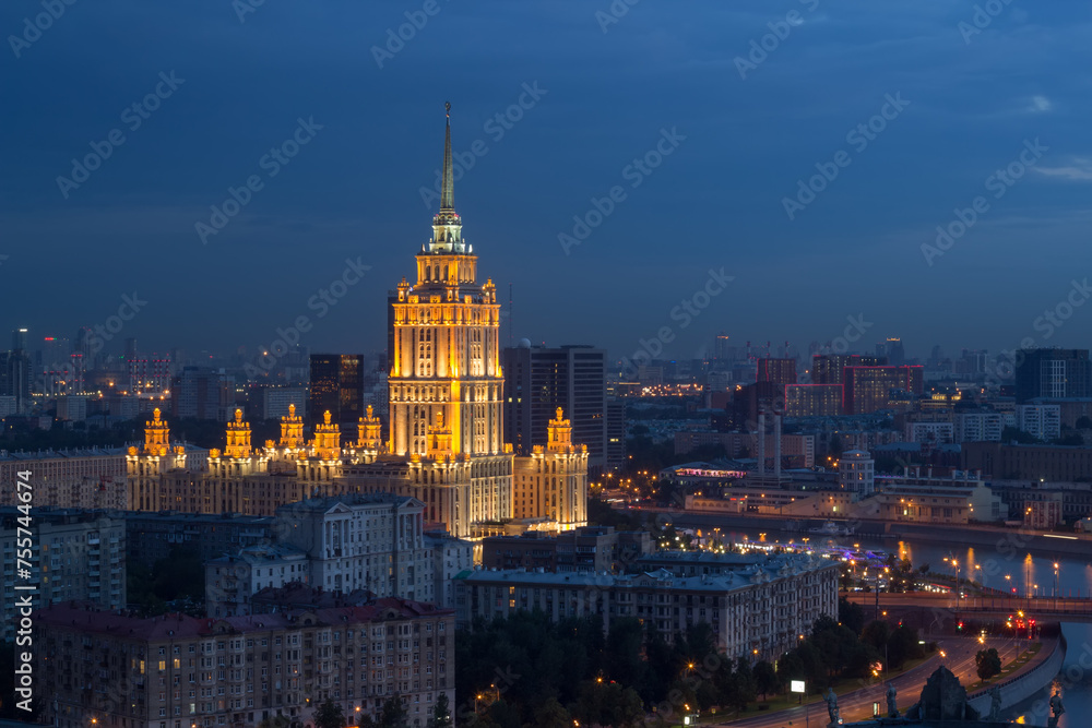 Ukraine hotel with illumination near river at night in Moscow, Russia