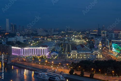 Kievsky railway station with illumination at night in Moscow, text - Kievsky railway stat photo