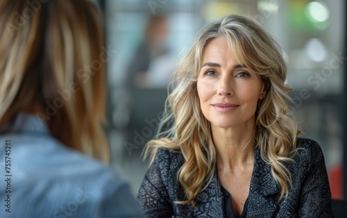 Wallpaper Mural Mid-career HR executive conducts job interview in company boardroom. Torontodigital.ca